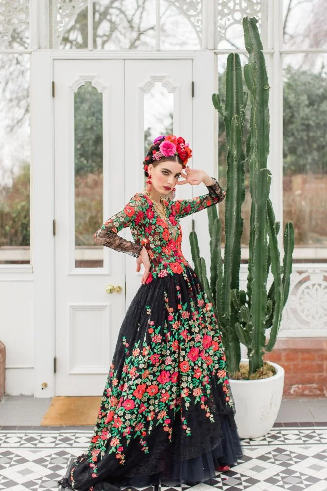 frida kahlo makeup look strong brows red lips flower crown